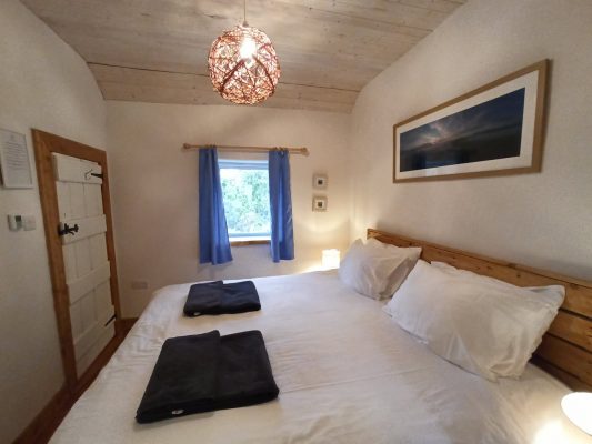 Bedroom at Birch Cottage, a simple and comfortable off-grid stay