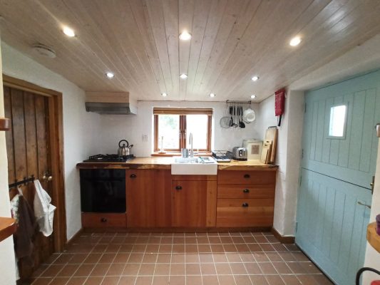 Kitchen area inside Birch Cottage, powered by renewable energy